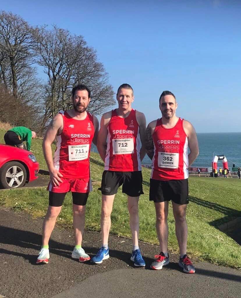(from left) Richard Fox, Paul McLaughlin and Damien Atkinson (PB) at the Larne 10M